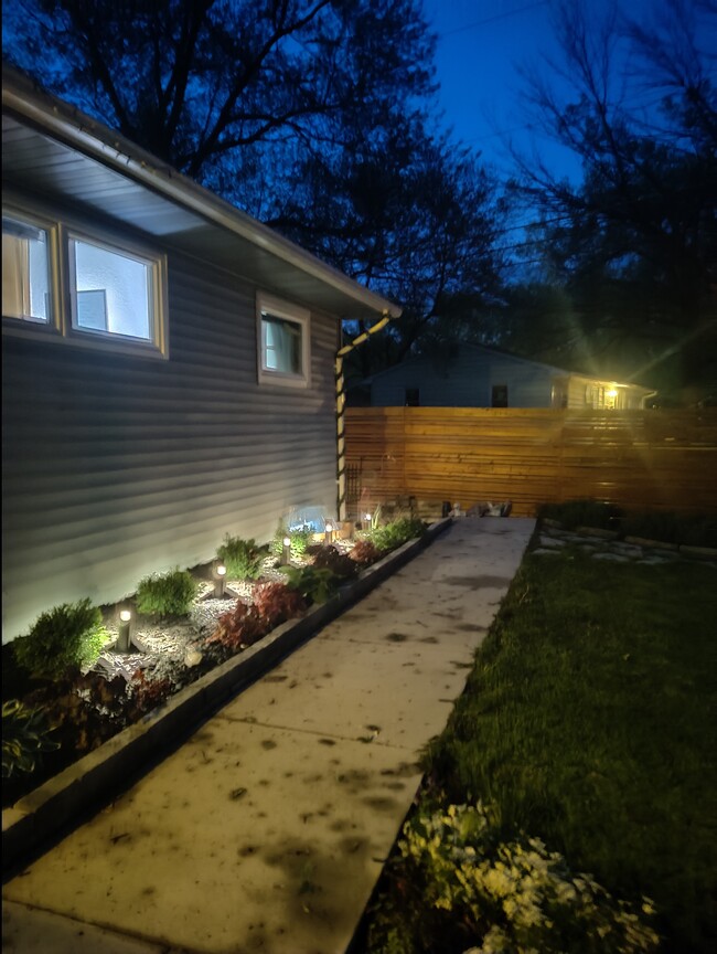 Dusk to dawn path lighting to private entrance - 2913 Clover St