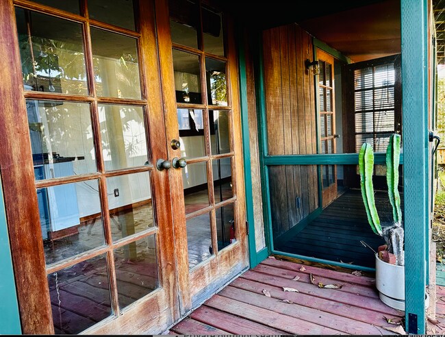 French doors open to enclosed screened porch AND open air outdoor porch - 2181 W 29th Pl