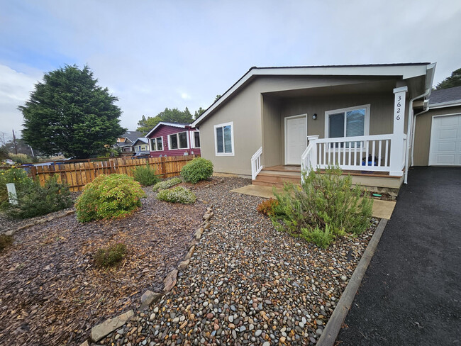 Front of home. Landscaped in all native plants for no needed upkeep. - 3626 Sea Mist Ave