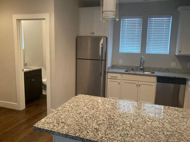 Kitchen 2nd floor and half bath - 520 Dr Db Todd Jr Blvd