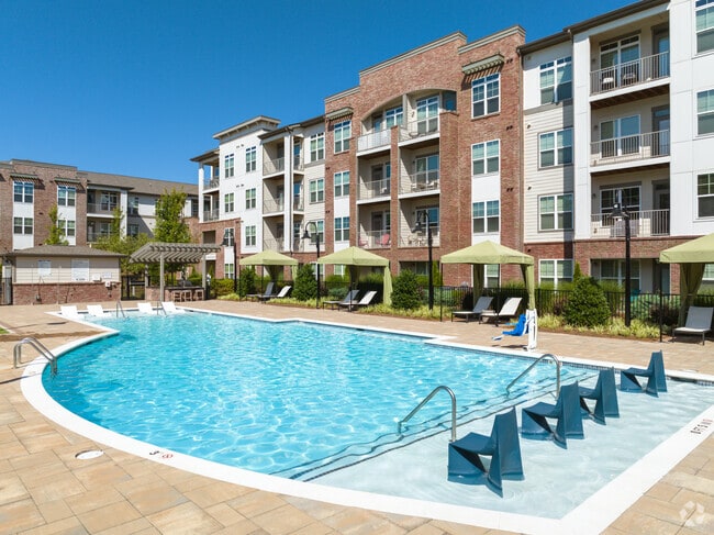Building Photo - Apartments at Eleven240