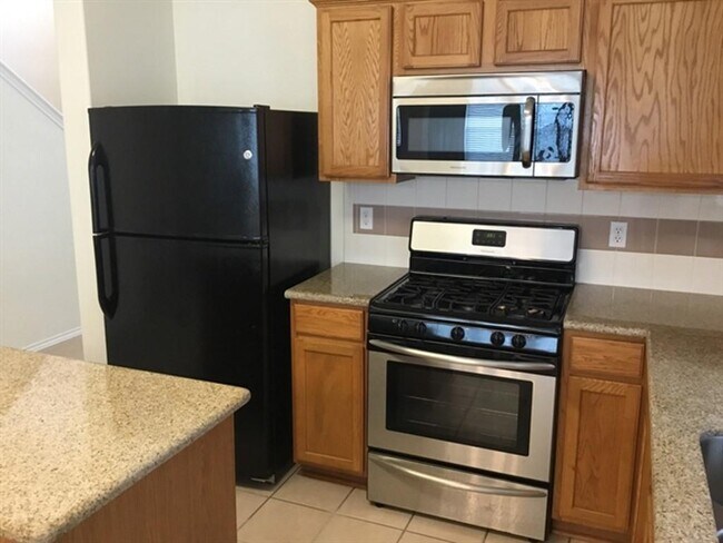 Building Photo - 6110 Promenade Ln