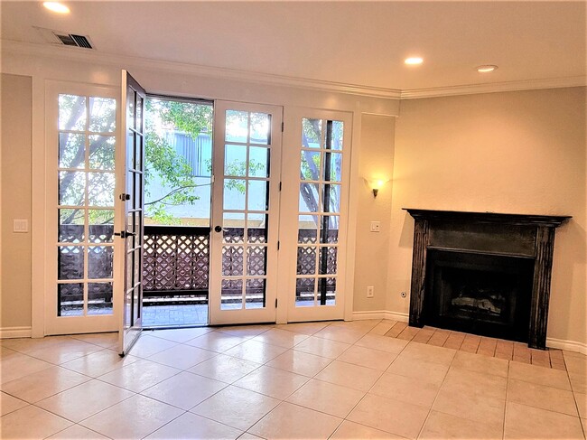 Oversized LR W/Fireplace, Vaulted Ceiling And French Doors Opening To The Patio. - 5834 Etiwanda Ave