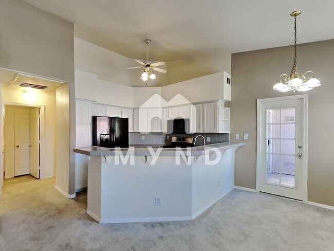 Building Photo - 5225 W Reno Ave Unit 204