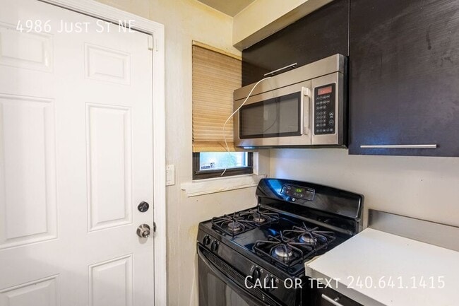 Building Photo - 4986 Just St NE