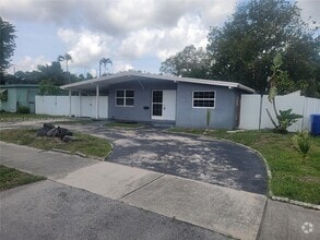 Building Photo - 1571 NE 43rd Ct
