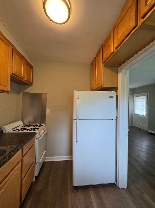 Foto del edificio - Spacious 1-Bedroom Duplex with Plenty of Kitchen Storage