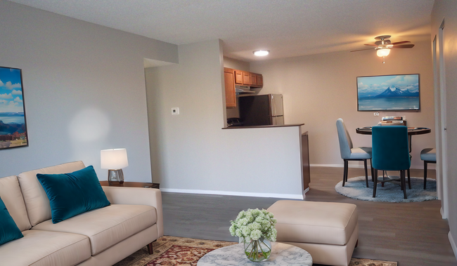 Spacious Living Room with Eat in Kitchen - Spencer Creek Apartments