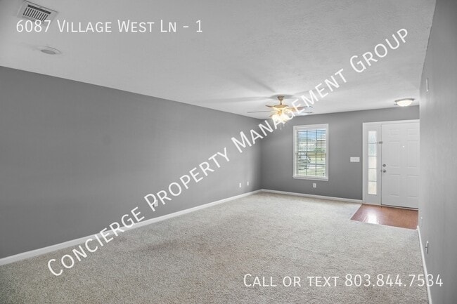 Building Photo - 6087 Village W Ln