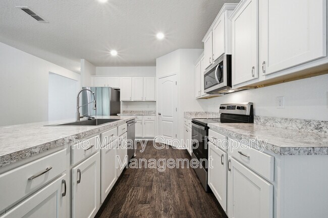 Foto del edificio - 7814 Meadow Walk Ln