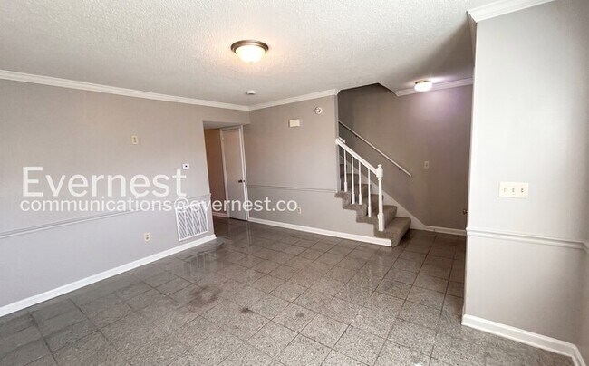 Building Photo - Modern Town Home with Off-Street Parking and Spacious Deck | Pet friendly | Available Now!