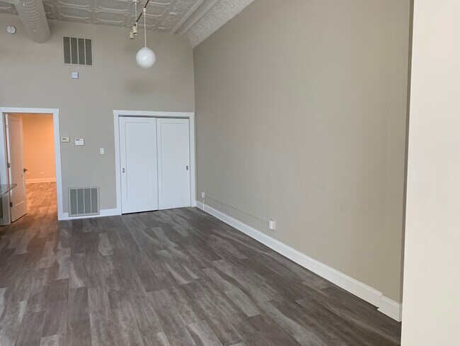 Front with additional deep closet - 3224 W North Ave