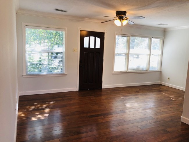 Living room is warm and welcoming - 1038 Rosepoint Dr