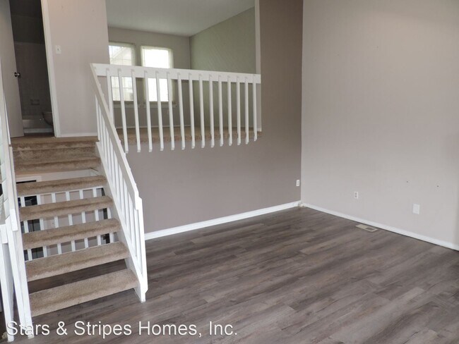 Building Photo - 3 br, 2 bath House - 9678 W. Chatfield Ave...