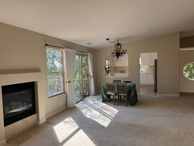 spacious and light living room with fireplace - 380 Greendale Ct