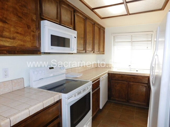 Building Photo - 2 br, 2.5 bath House - 6348 Slippery Creek...