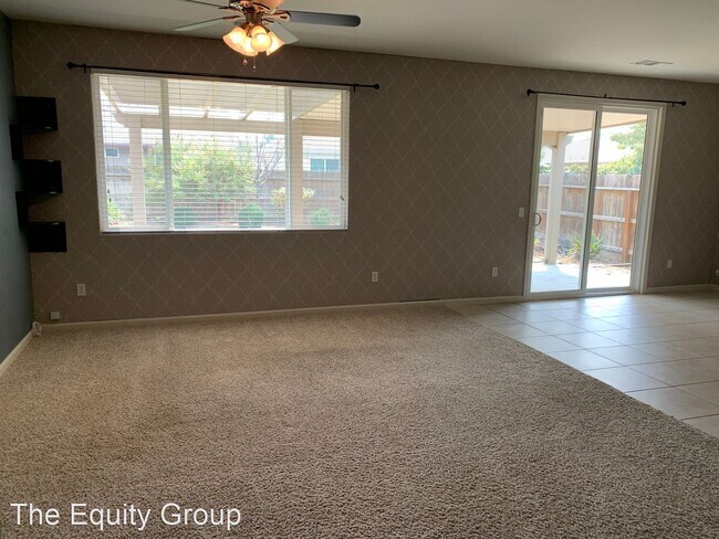 Building Photo - 4 br, 2 bath House - 6325 West Perez Ave