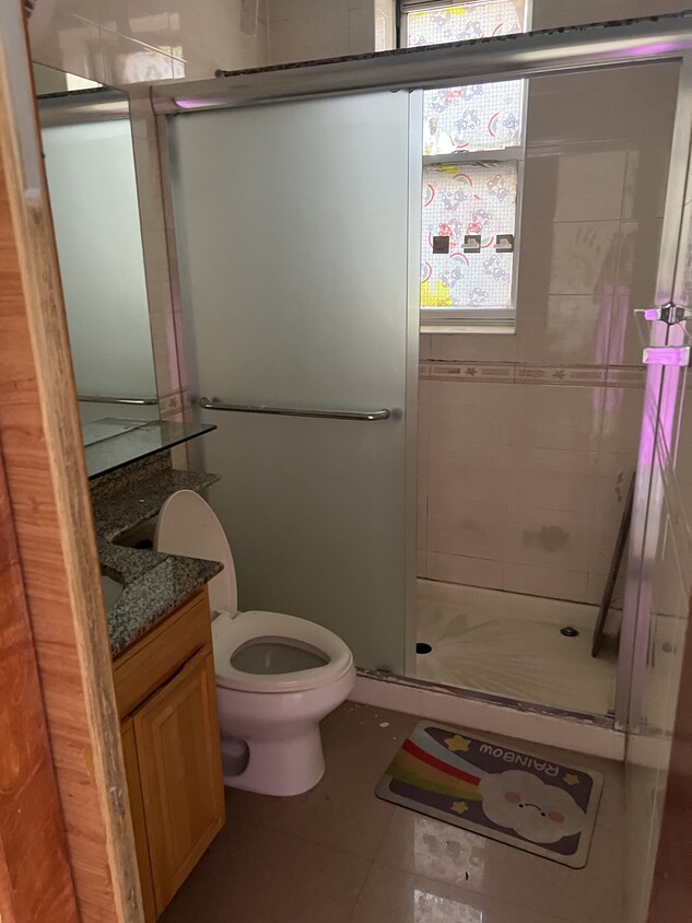 Bathroom with standing shower - 4801 8th Ave