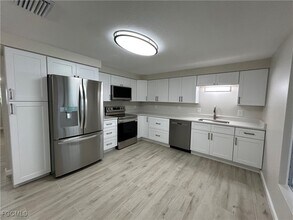 Building Photo - 6128 Cocos Dr