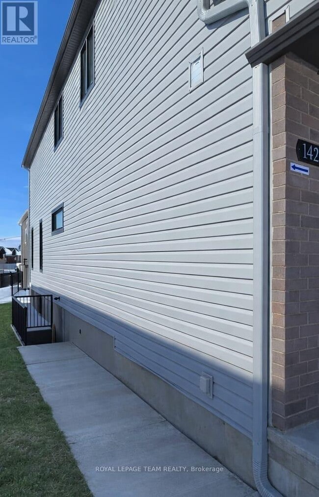 Photo du bâtiment - 142 Lumen Pl