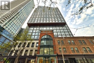Building Photo - 100 Queen St E