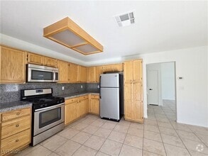 Building Photo - 6993 Troubador Dr