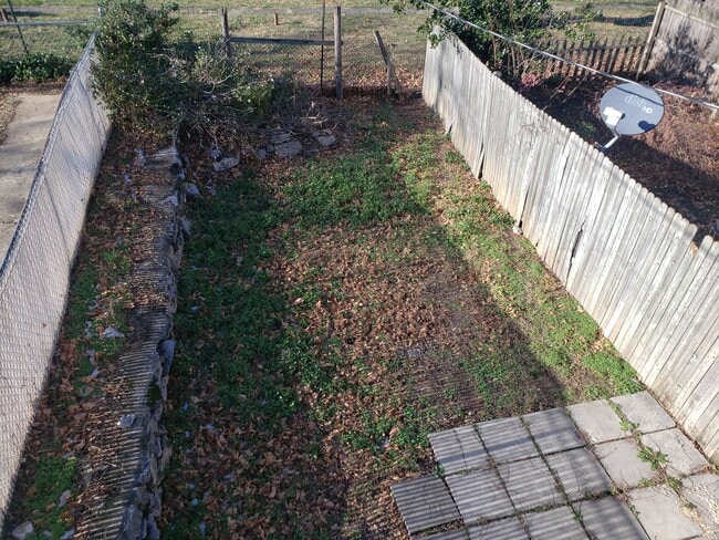 Fenced back yard - 115 S Locust St