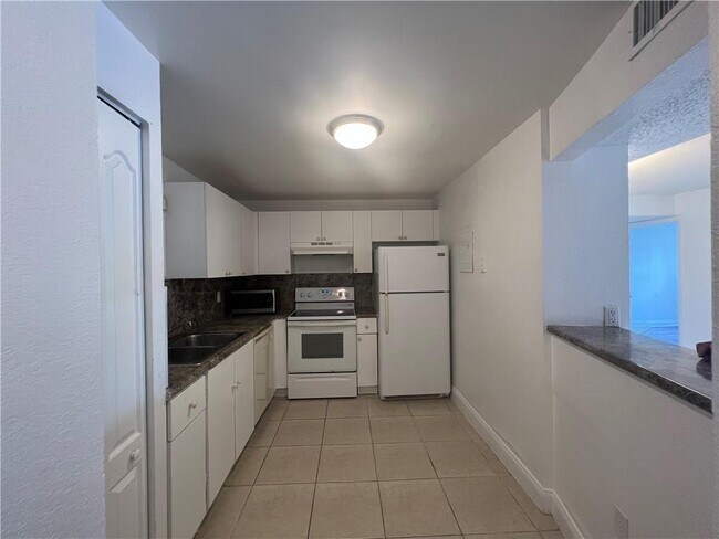 Building Photo - 4215 N University Dr