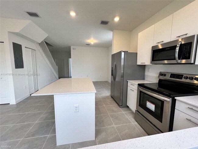 Foto del edificio - 3 br, 3 bath House - 12285 NW 24th Pl