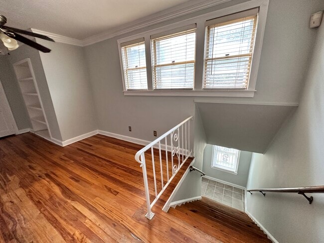 Bright welcoming stairwell with small landing - 1742 North Pkwy