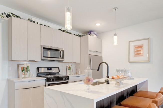 2 BR Kitchen with waterfall island and pendant lighting - The Franklin at Hillsborough