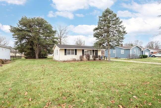 Building Photo - DEPOSIT MOVES YOU IN! No rent due until Ap...