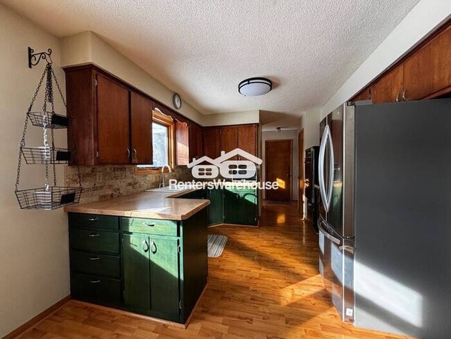 Building Photo - Available now! Welcome home to this 4 bed 2 bath single family home in Farmington with a spacious...