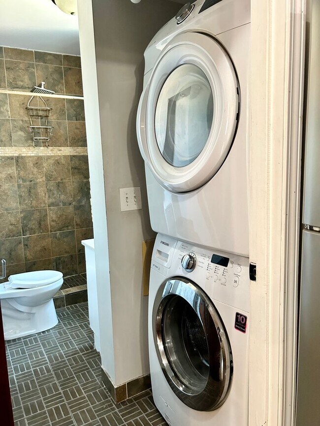 Building Photo - Condo with free heat! In-unit laundry, har...