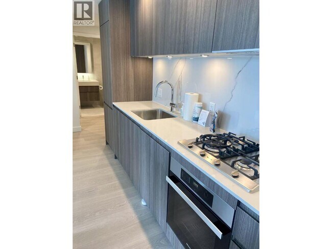Photo du bâtiment - 6537 Telford Ave