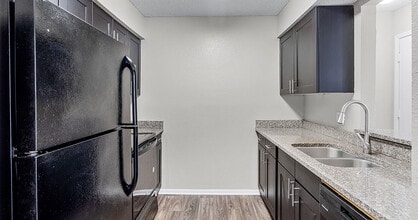 Building Photo - The Oaks of Woodland Park Apartments