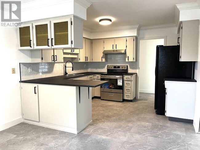 Photo du bâtiment - 2 E 47th Ave