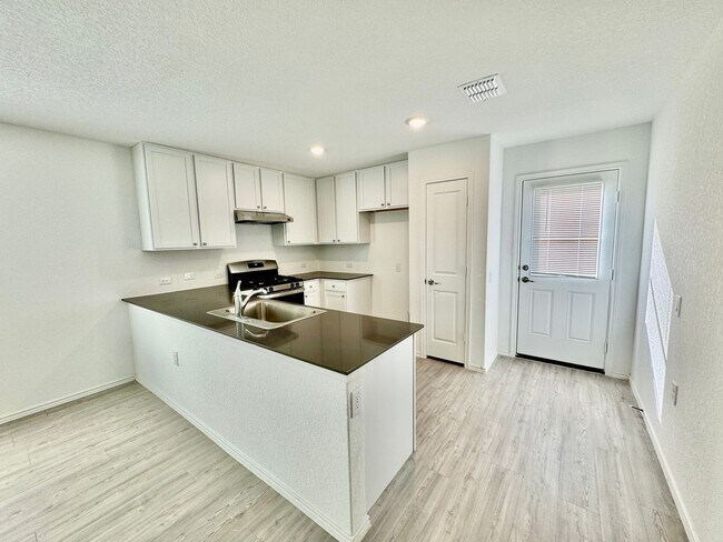 Building Photo - New Construction ~ Great Location ~ Conven...