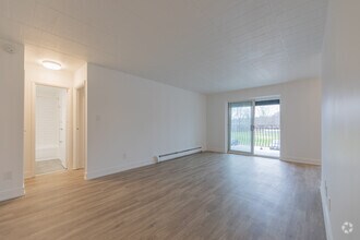 1BR, 1BA - 791SF - Living Room - 500 Glenelm Crescent