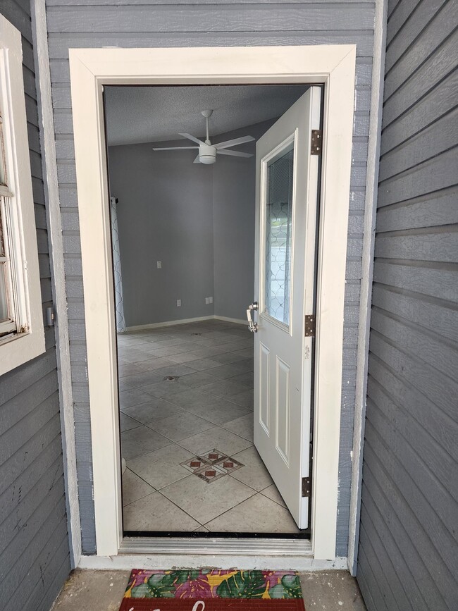 Front door open to Living Area - 13 A Empress Lane