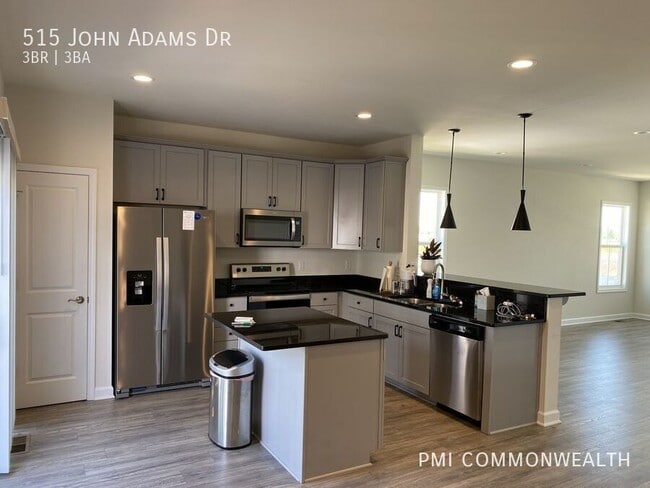 Building Photo - 515 John Adams Dr NW
