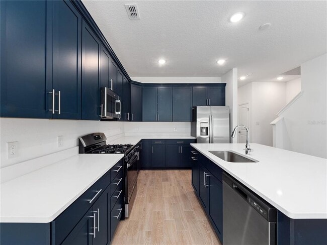 Foto del edificio - 15166 Blue Peacock Ln