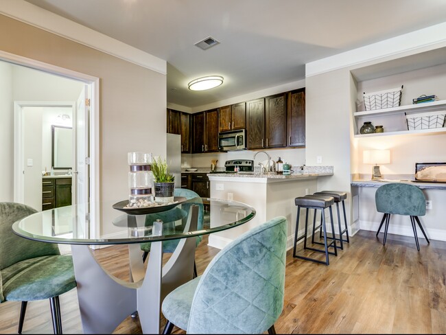 Living Area with Home Office - Creekstone at RTP Apartments