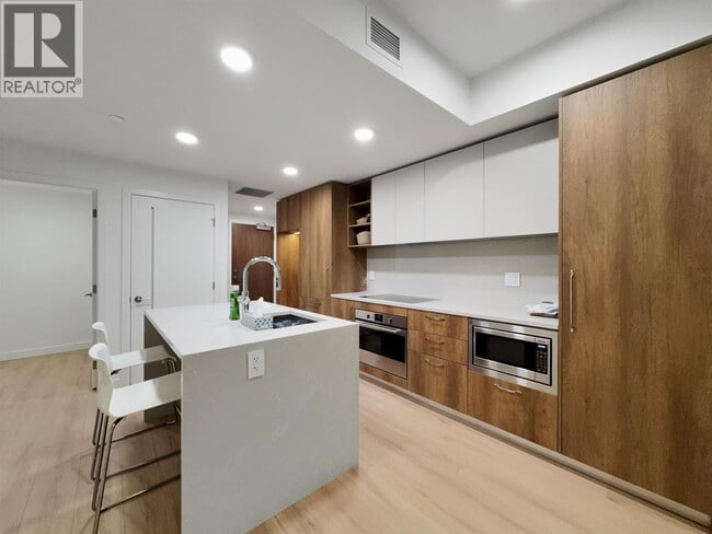 Building Photo - 133 W 49th Ave