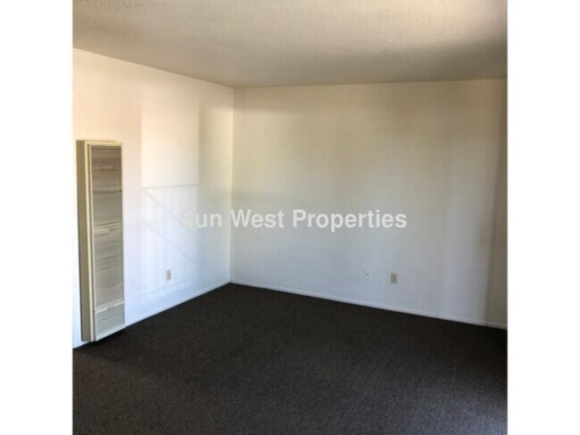Building Photo - All utilities paid! Laundry on site!