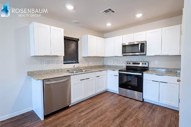 Building Photo - 11094 W Arvada Dr