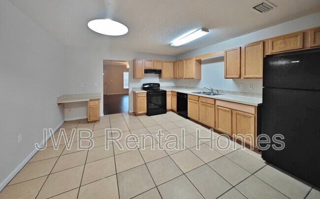 Building Photo - 8422 McGirts Village Ln