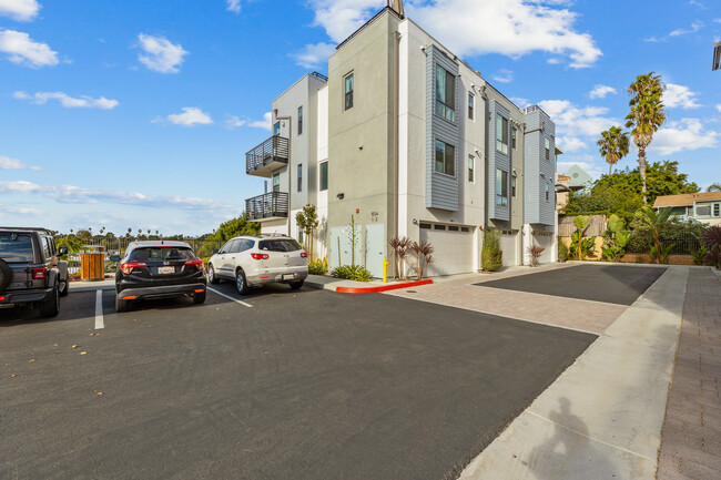 Driveway view of home - front unit - 1554 Vista del Mar Way