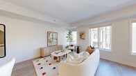 Located at 31 Farmstead Road in Toronto's sought-after M2L neighbourhood, this well-appointed 2-bedroom, 3-bathroom residence spans three floors, offering a thoughtfully designed living experience with modern finishes throughout. Light hardwood flooring flows seamlessly across all levels, complementing the clean white walls and creating a bright, cohesive aesthetic.

The main floor hosts the open-concept kitchen and living area. The kitchen is a standout, featuring flat-front white cabinetry extending to the ceiling, a sleek white quartz island, a crisp subway tile backsplash, and stainless steel appliances including a built-in range and French door refrigerator. The adjacent living room is bathed in natural light through generous windows, offering views of the surrounding neighbourhood.

Three well-appointed bathrooms serve the home, including a full bath with a soaker tub-shower combo framed in white tile and a clean floating vanity. A convenient powder room is also present on one of the floors. Each bathroom maintains the home's consistent modern and minimal design language.

The two bedrooms are comfortably scaled and bright. The primary bedroom on the upper floor features recessed lighting and a private door leading to an outdoor terrace — a rare and desirable feature. The second bedroom offers ample natural light and flexible use as a guest room or home office. The topmost floor provides additional terrace space, completing this refined urban home.