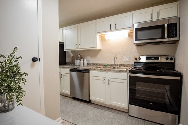 1 BR, 1 BA - Living Room (Type B) - Roman Villa Apartments